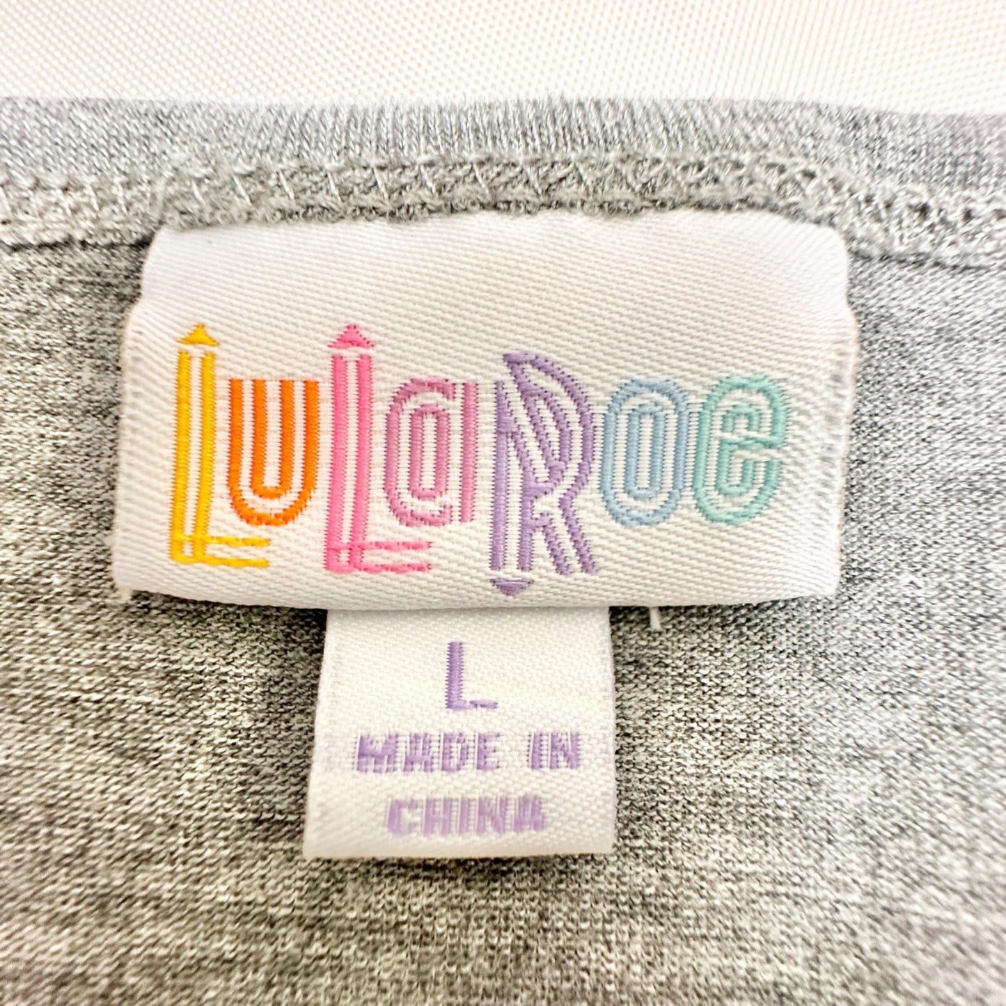 LuLaRoe Irma Tunic Top Womens Large Gray with Colorful Tribal Hi Lo Hem SS