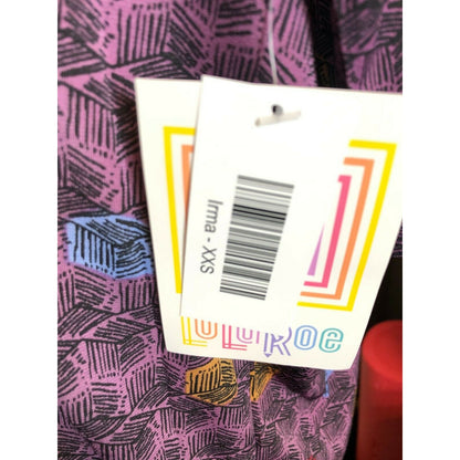 LuLaRoe Irma XXS Purple Geometric Print Short Sleeve Tunic Top Hi Low Hem